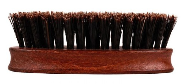 Featuring boar bristles, the Dark Stage Beard Brush can easily pull through the toughest beards
