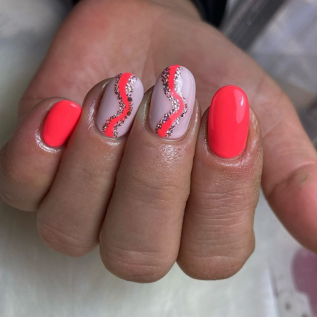 Coral pink with glitter nails