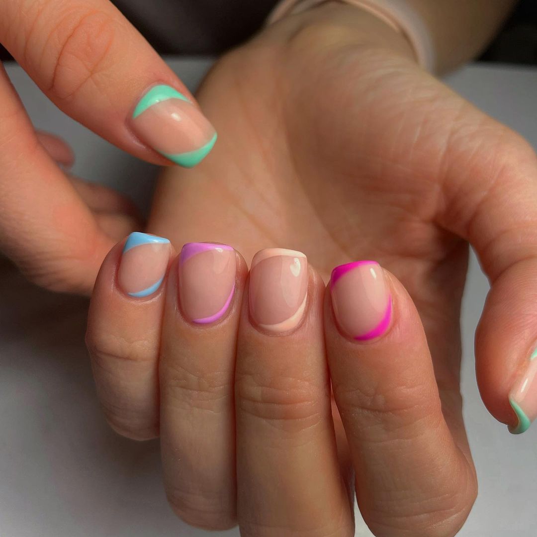 multi coloured nail art for festivals in 2023