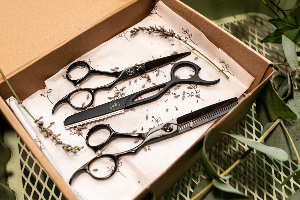 Flat lay image of leaf scissors in a brown box