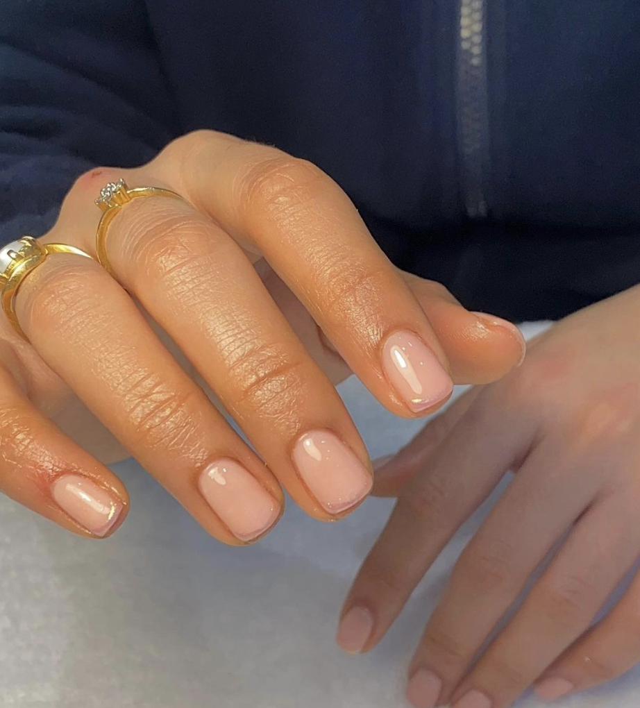 Image of natural nails with a pink polish
