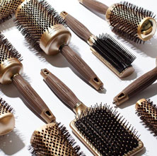 A picture of a range of brown hairbrushes