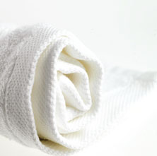A picture of folded white towels